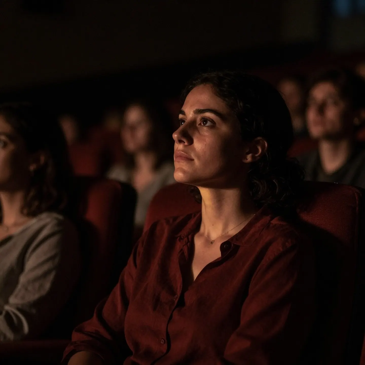 An audience watching a film